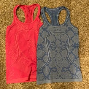 two Lululemon stretchy tank tops